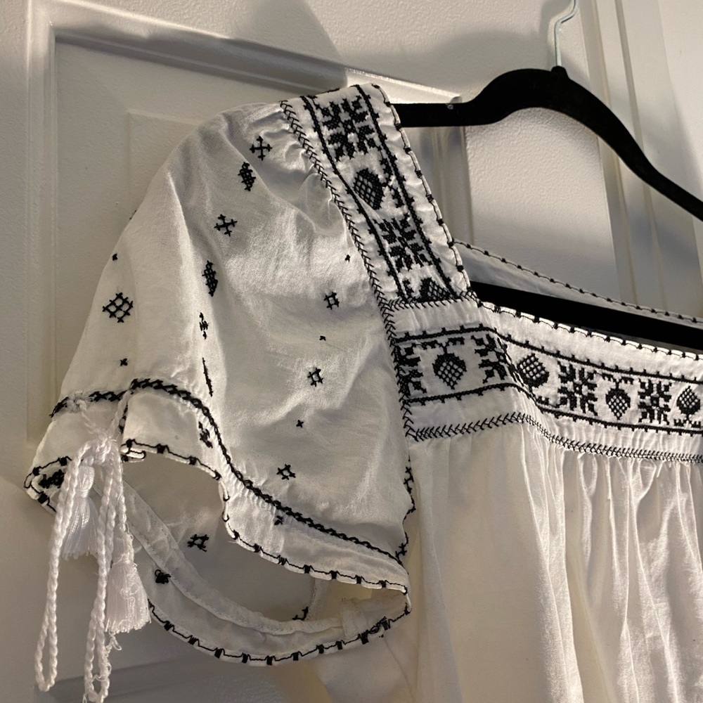 Embroidered white linen shirt